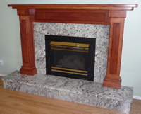elegant fireplace with granite tiles